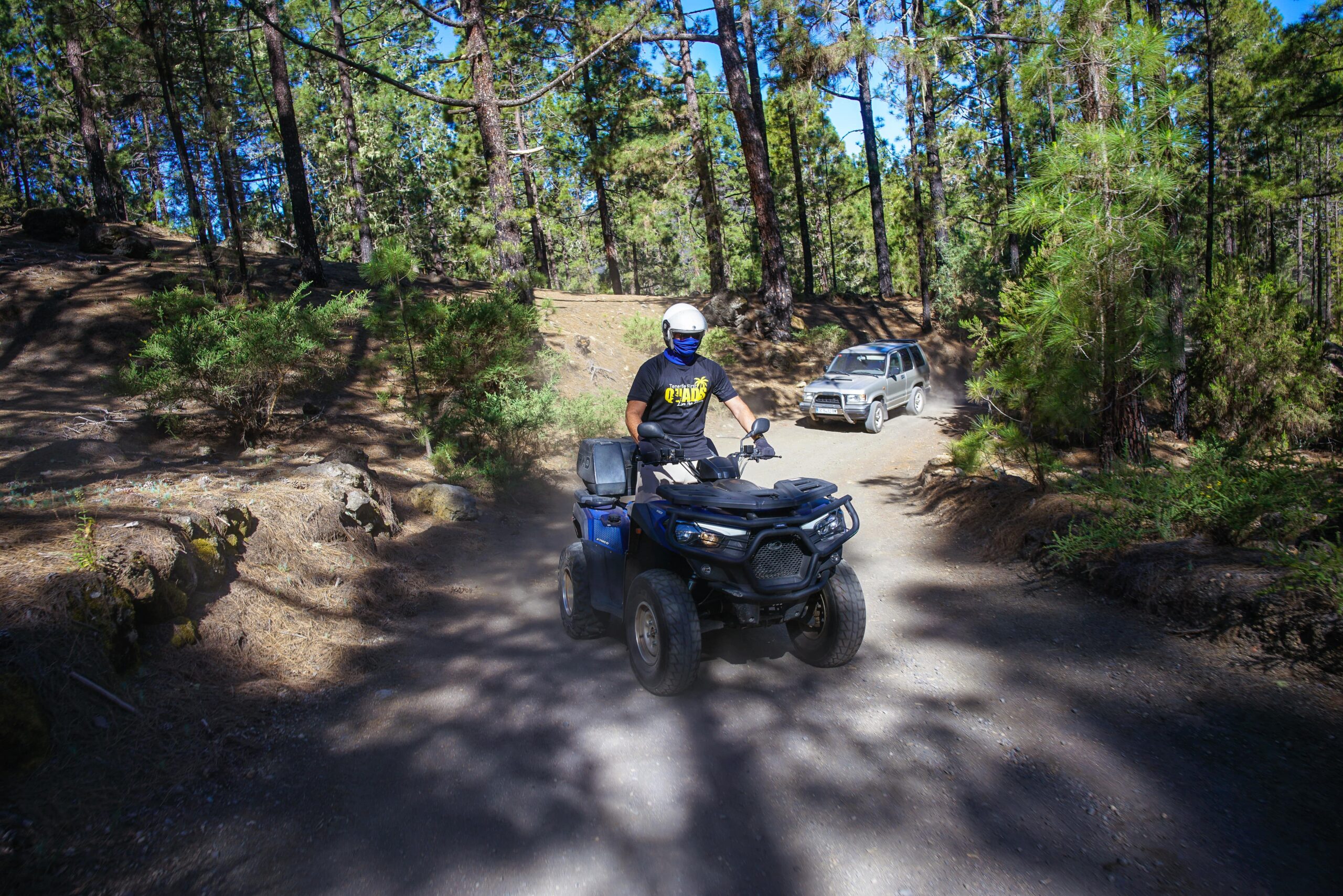 Quad with loads of dust in the Corona Forest in Teide